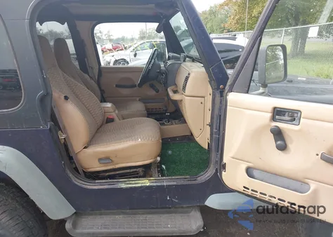 1999 Jeep Wrangler Sport z USA, uszkodzony, nr VIN 1J4FY19S5XP405523